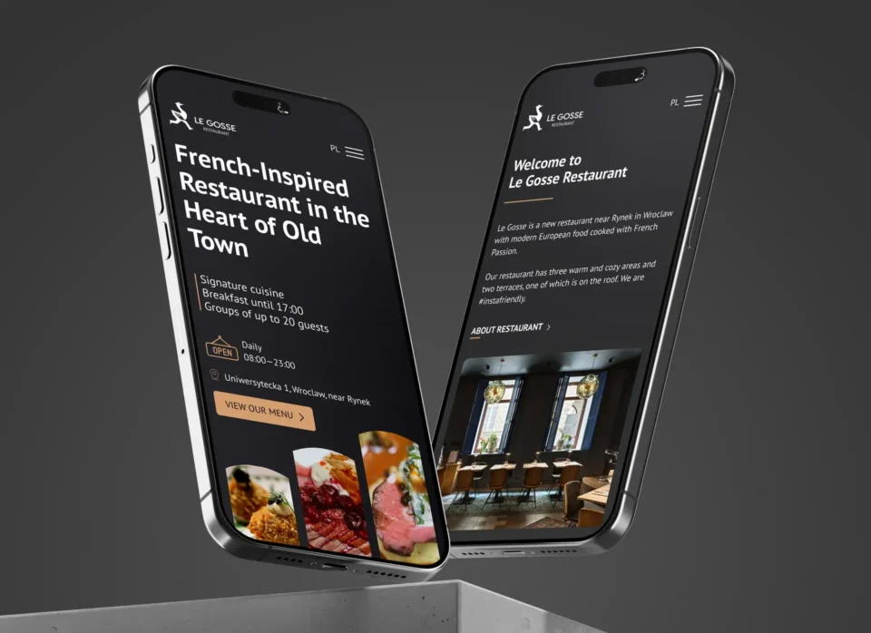 Страницы сайта для французского ресторана на экране мобильного телефона